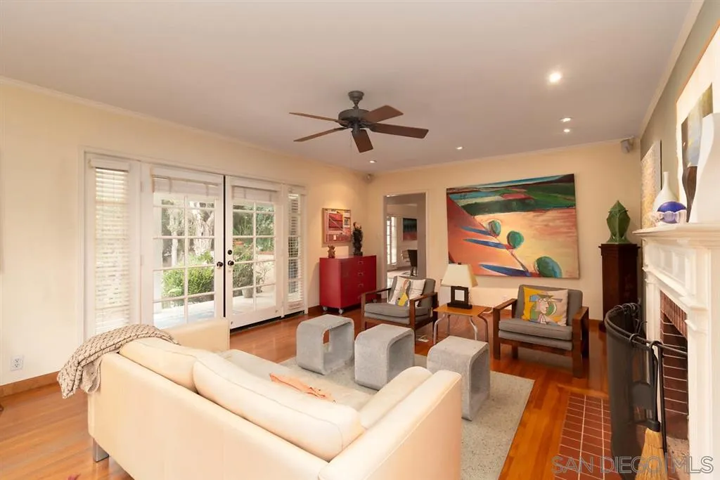 5004 Marlborough Drive San Diego, CA 92116 - Photo 8 of 25 a living room with furniture and a flat screen tv