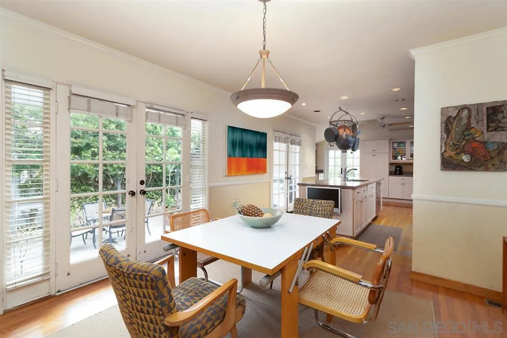 5004 Marlborough Drive San Diego, CA 92116 - Photo 10 of 25 a view of a dining room with furniture and wooden floor