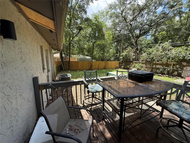 a view of a tables and chairs in the patio