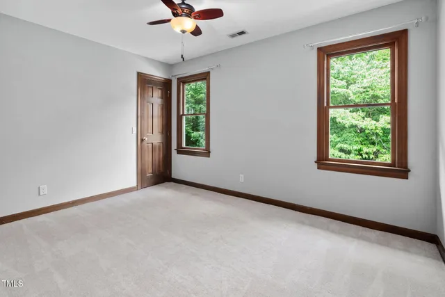 a bathroom with a sink and a large mirror