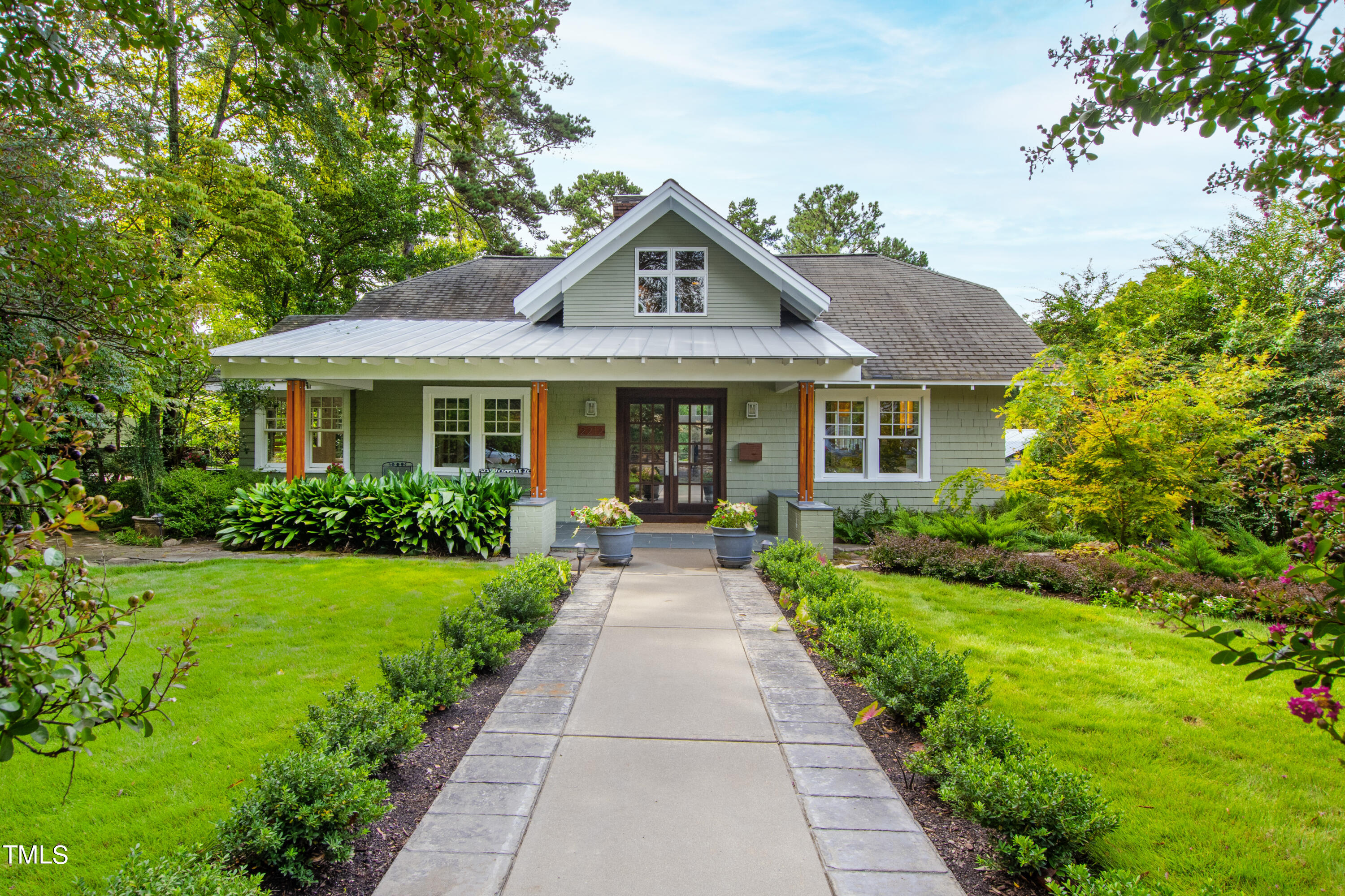 2212 The Circle Raleigh, NC 27608 - Photo 1 of 88 a view of a house with garden