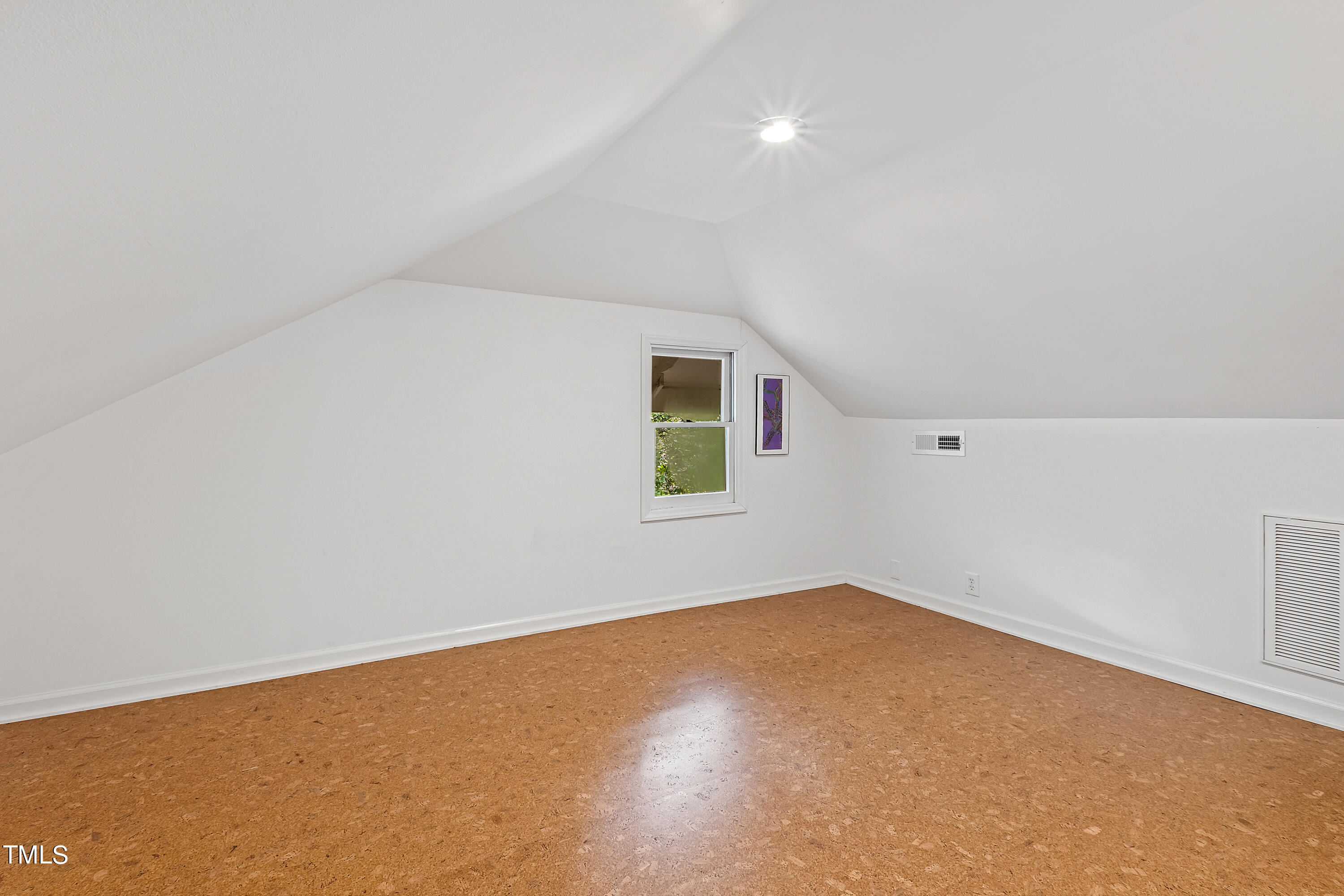 2212 The Circle Raleigh, NC 27608 - Photo 54 of 88 an empty room with a window