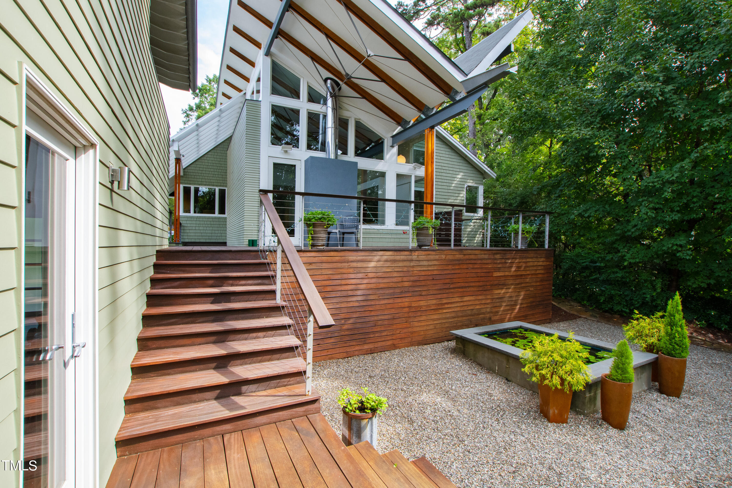2212 The Circle Raleigh, NC 27608 - Photo 64 of 88 a view of a house with wooden fence