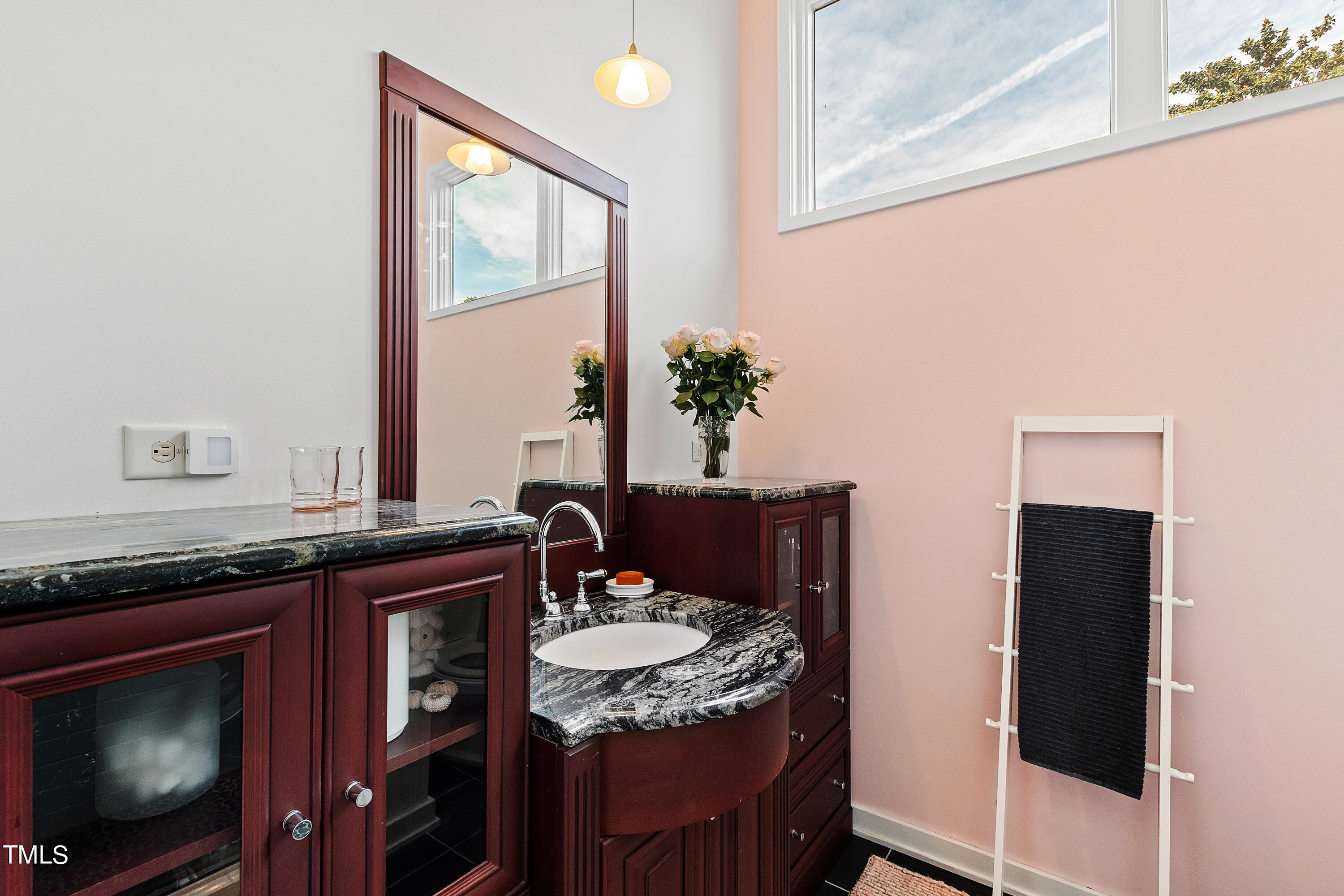 2212 The Circle Raleigh, NC 27608 - Photo 76 of 88 a kitchen with a granite countertop sink a stove and a refrigerator