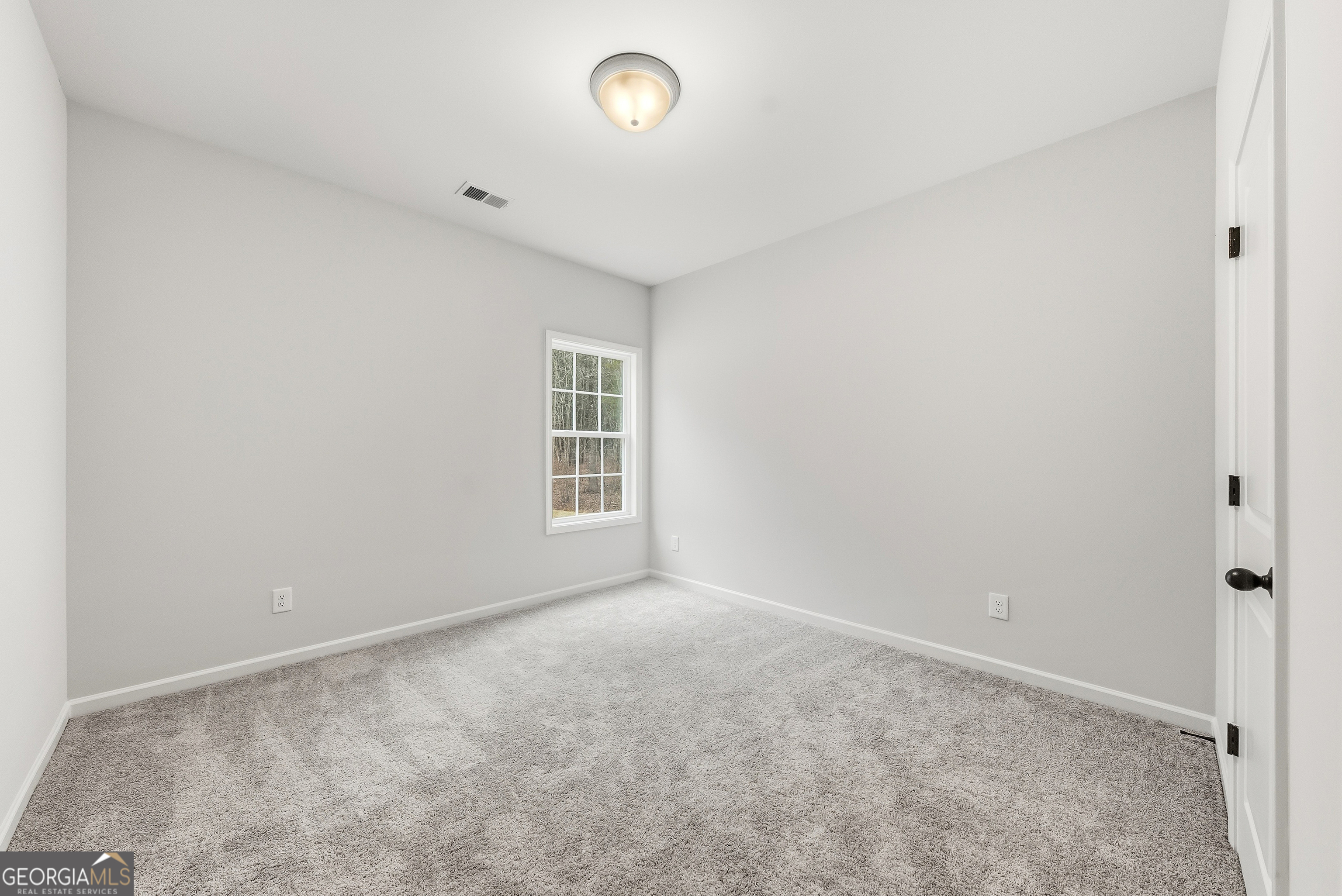 75 Oak Ridge Drive, Unit 4 Pine Mountain, GA 31822 - Photo 17 of 41 an empty room with windows