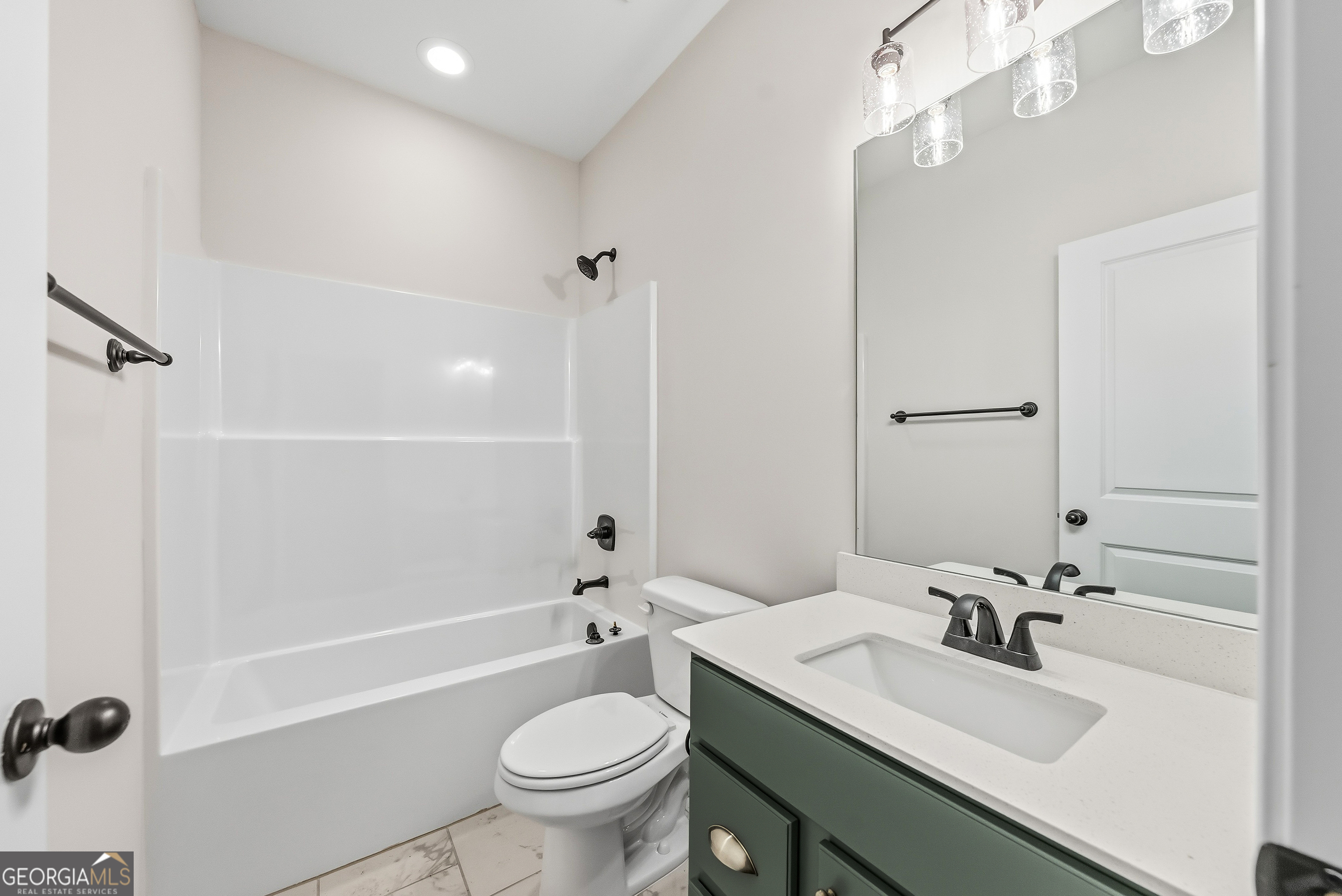 75 Oak Ridge Drive, Unit 4 Pine Mountain, GA 31822 - Photo 19 of 41 a bathroom with a sink a toilet and shower