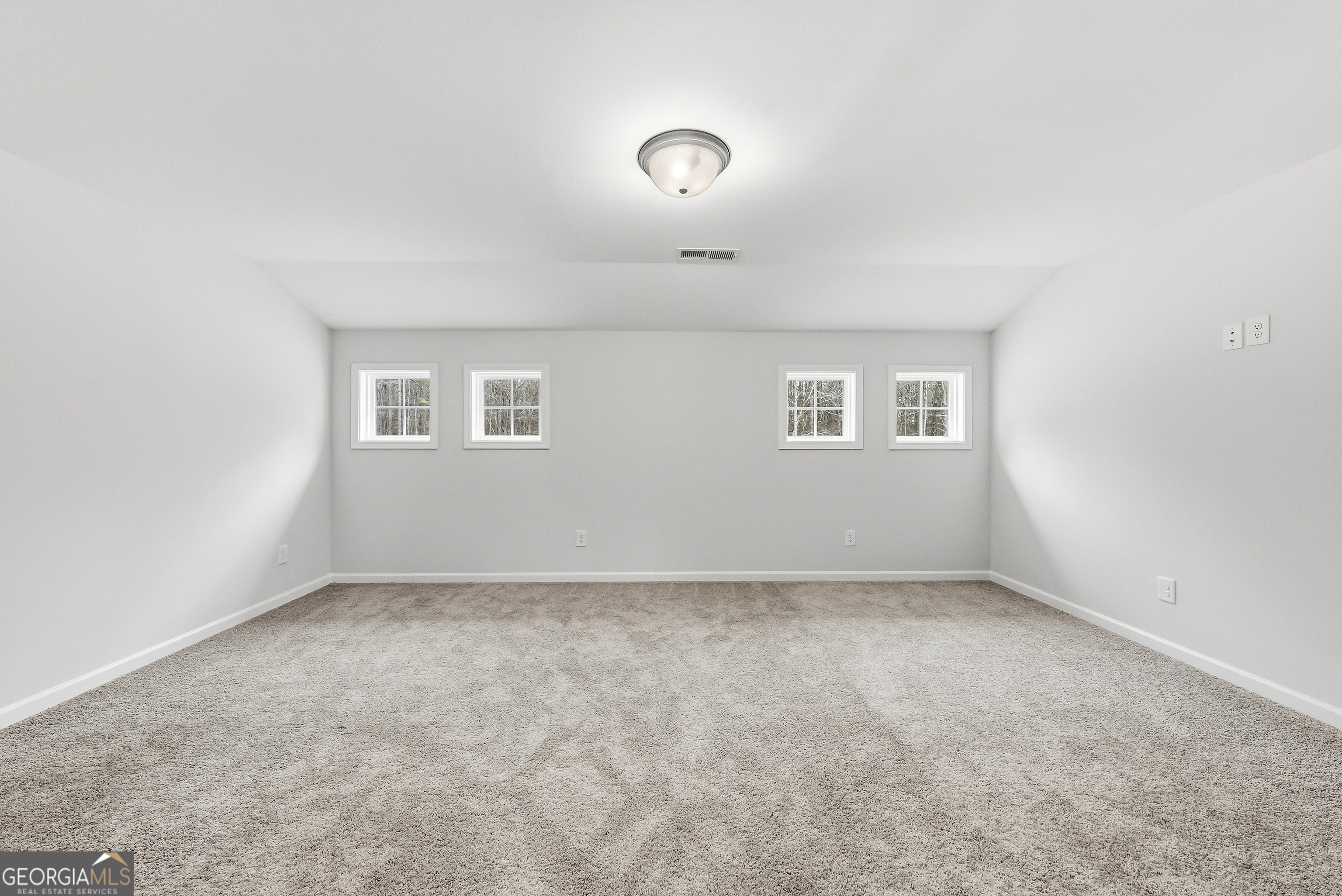 75 Oak Ridge Drive, Unit 4 Pine Mountain, GA 31822 - Photo 28 of 41 an empty room with a empty space and windows
