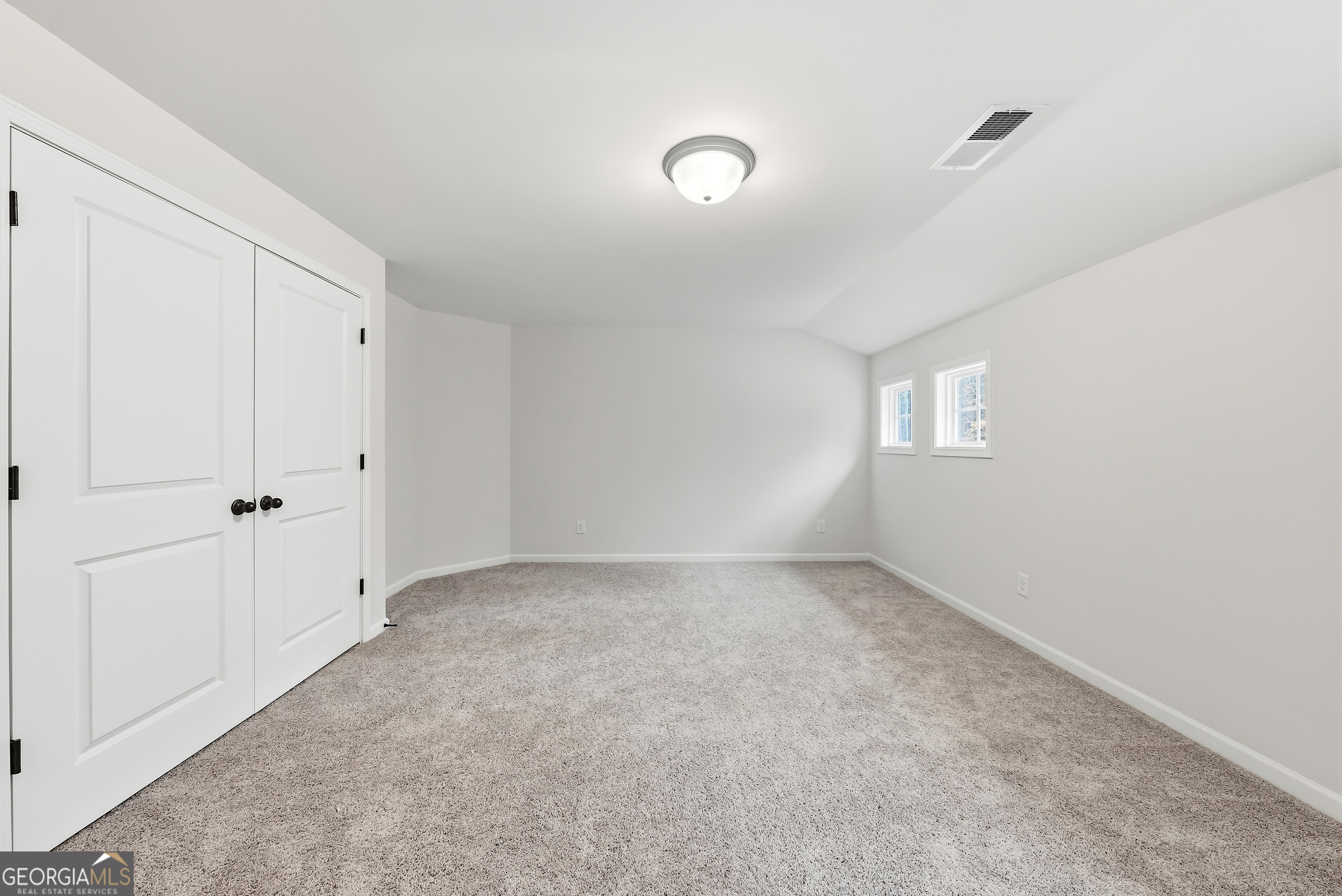 75 Oak Ridge Drive, Unit 4 Pine Mountain, GA 31822 - Photo 29 of 41 a view of an empty room with a window
