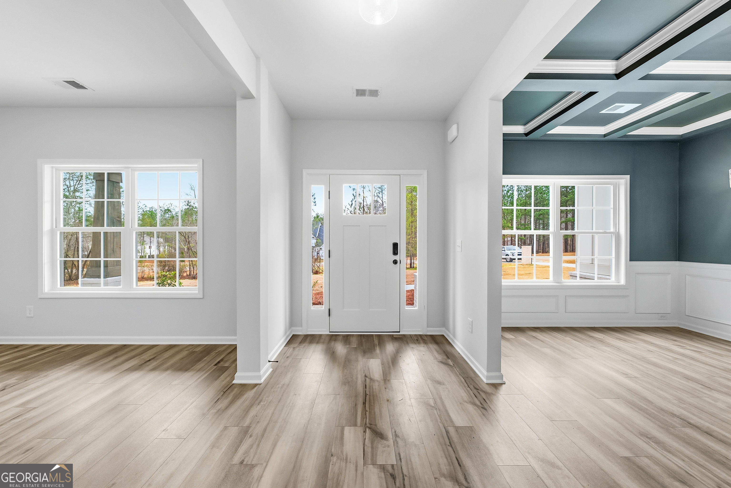 75 Oak Ridge Drive, Unit 4 Pine Mountain, GA 31822 - Photo 4 of 41 an empty room with wooden floor and windows