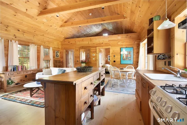 a view of a dining room with furniture