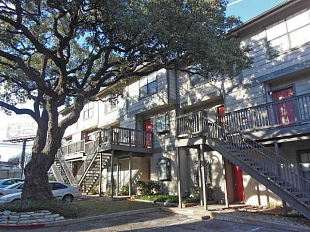 a view of a street with houses