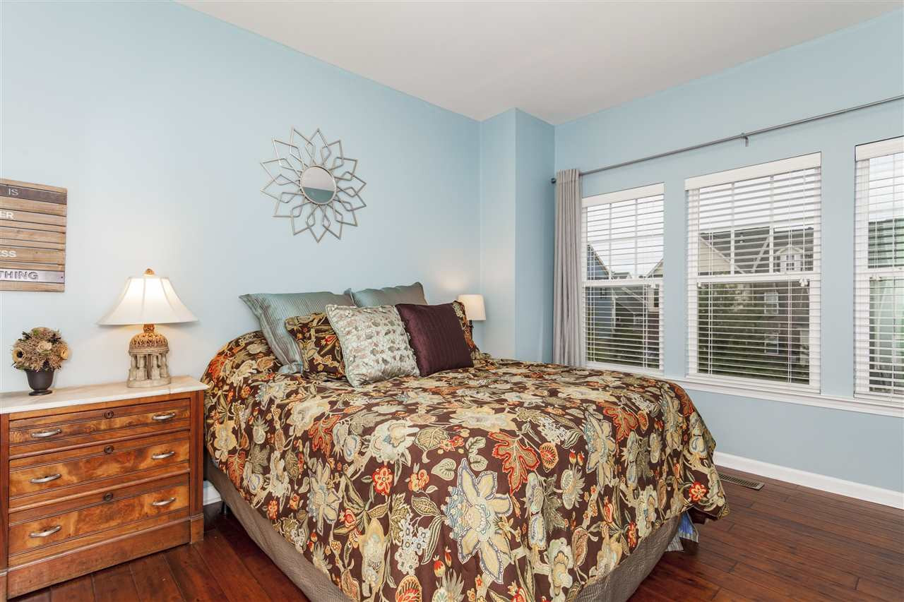 1434 Van Page Boulevard Raleigh, NC 27607 - Photo 20 of 25 Enjoy this spacious second upstairs bedroom with beautiful natural light, a closet, and hardwoods! Bedroom 2