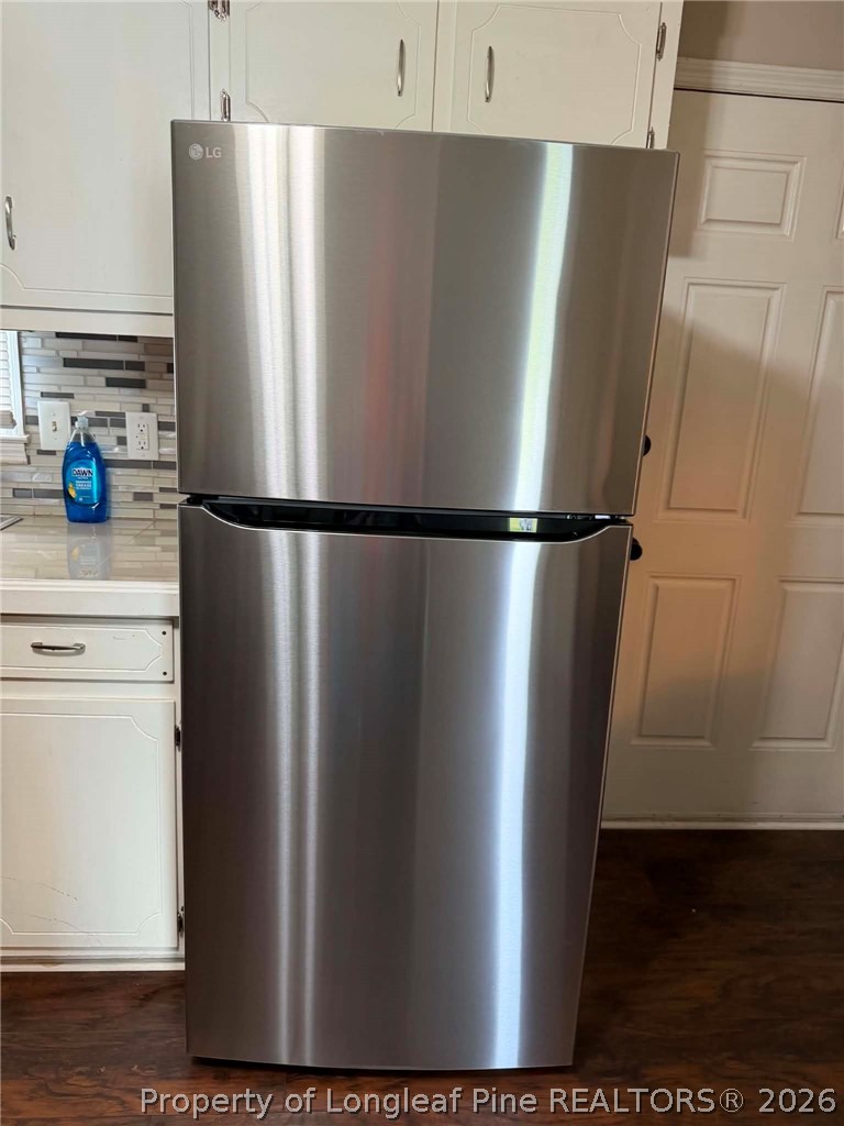 634 Dallas Road Lumberton, NC 28358 - Photo 10 of 27 a metallic refrigerator freezer sitting in a kitchen