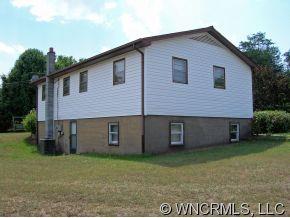394 Whiteside Road Rutherfordton, NC 28139 - Photo 2 of 12 a view of a house with a yard