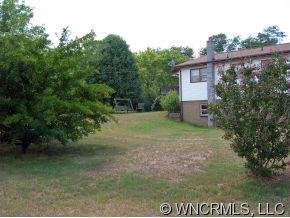 394 Whiteside Road Rutherfordton, NC 28139 - Photo 12 of 12 a view of a house with a yard