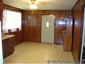 394 Whiteside Road Rutherfordton, NC 28139 - Photo 5 of 12 a view of hallway with a bathroom and a sink