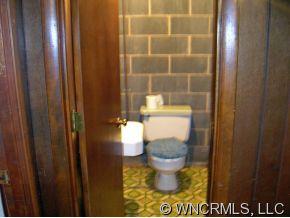 394 Whiteside Road Rutherfordton, NC 28139 - Photo 9 of 12 a bathroom with a toilet and a sink