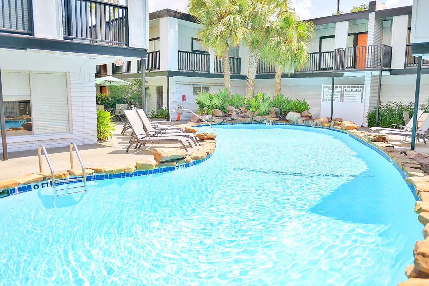 219 Marshall Street, Unit 216 Houston, TX 77006 - Photo 9 of 10 a view of a house with backyard and sitting area