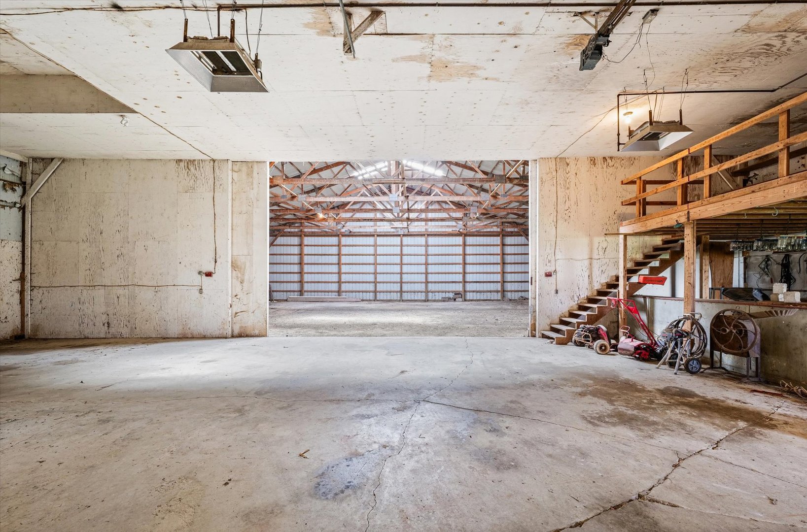 7961 North 3000 E Road Forrest, IL 61741 - Photo 50 of 66 a view of a garage with rack and bicycle