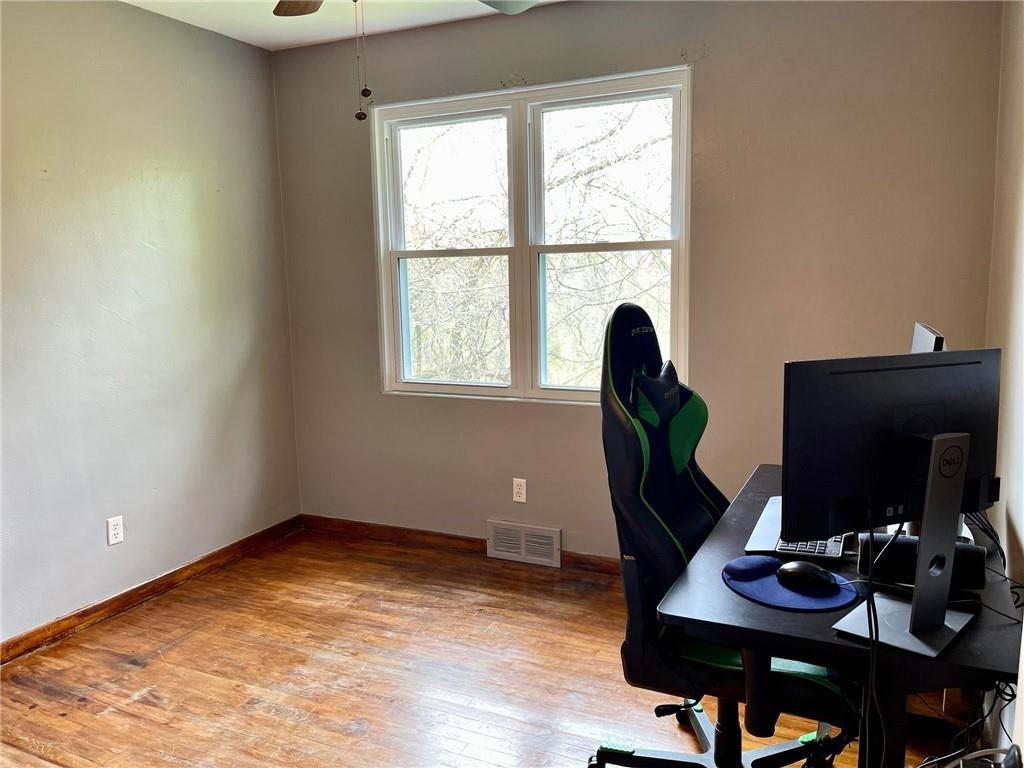 700 Ottillia Street Pittsburgh, PA 15210 - Photo 13 of 20 a workspace with furniture and window