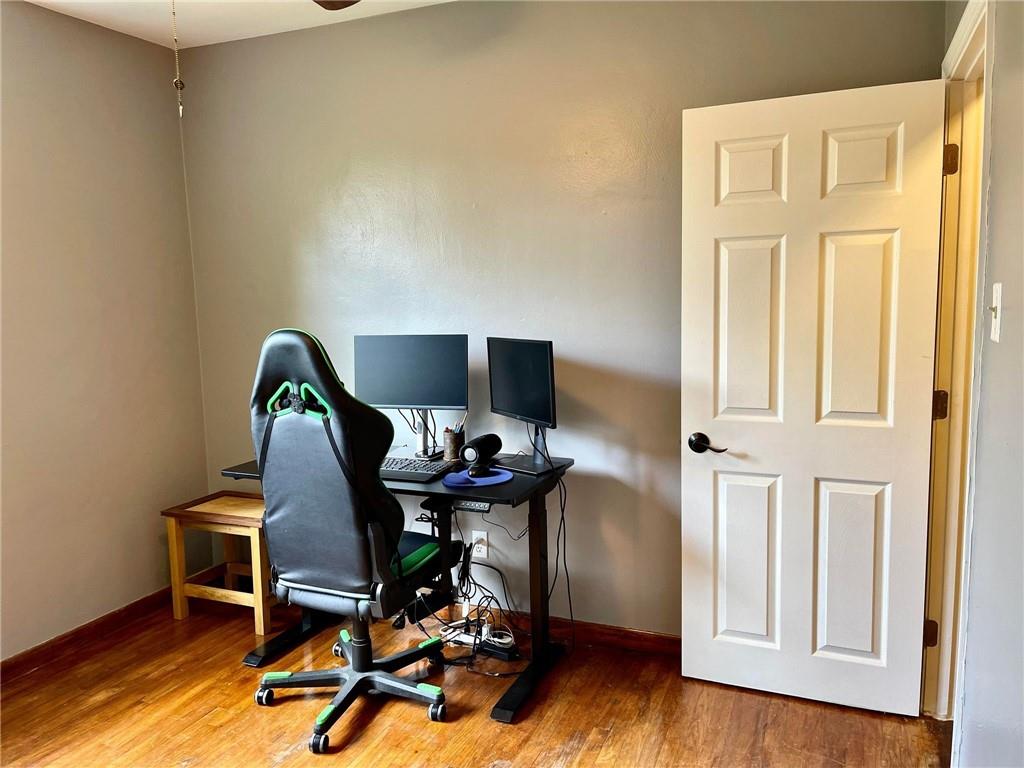 700 Ottillia Street Pittsburgh, PA 15210 - Photo 14 of 20 a workspace with furniture and wooden floor