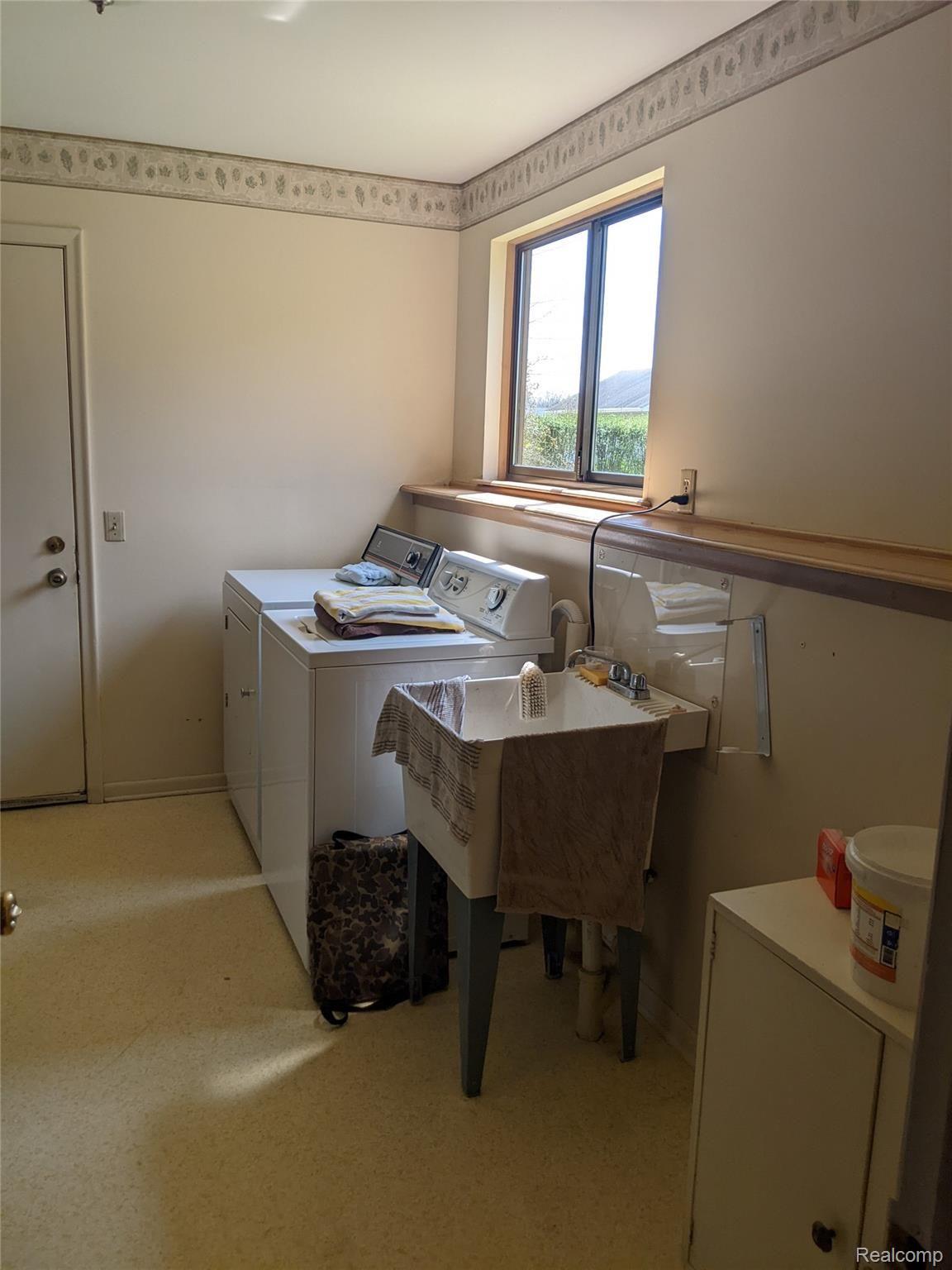 6221 Calkins Road Flint, MI 48532 - Photo 16 of 26 6221 Calkins Laundry Room.jpg