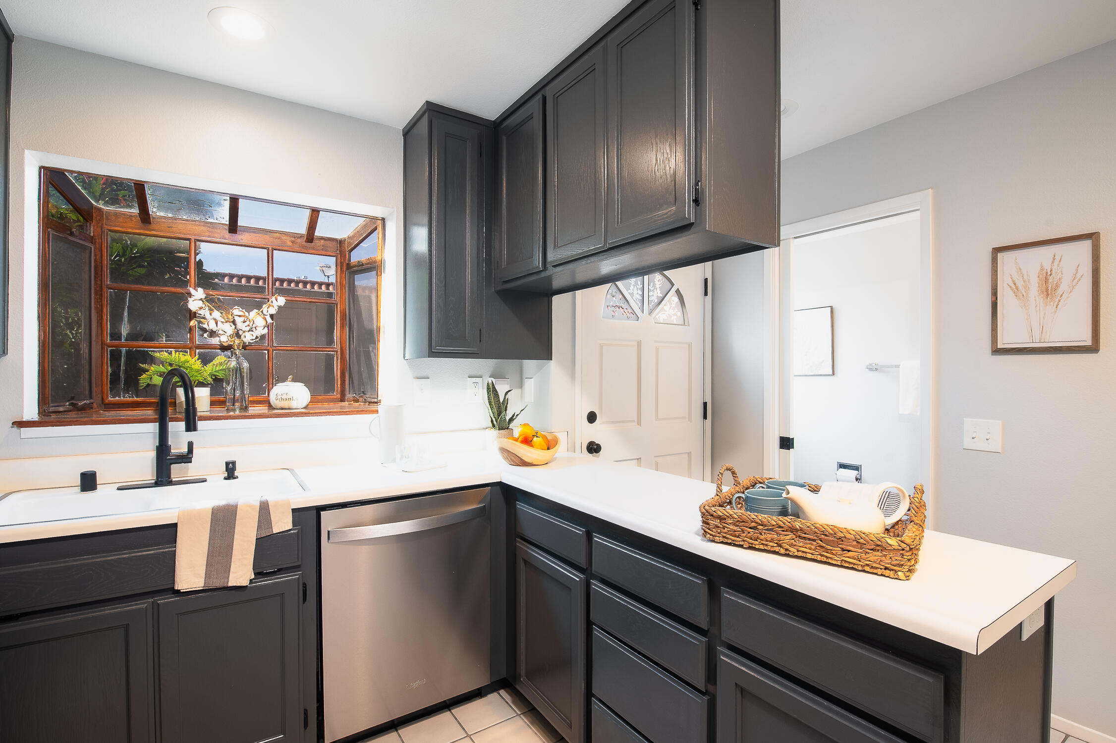 4344 Modoc Road, Unit 2 Santa Barbara, CA 93110 - Photo 14 of 28 a kitchen with a sink and cabinets