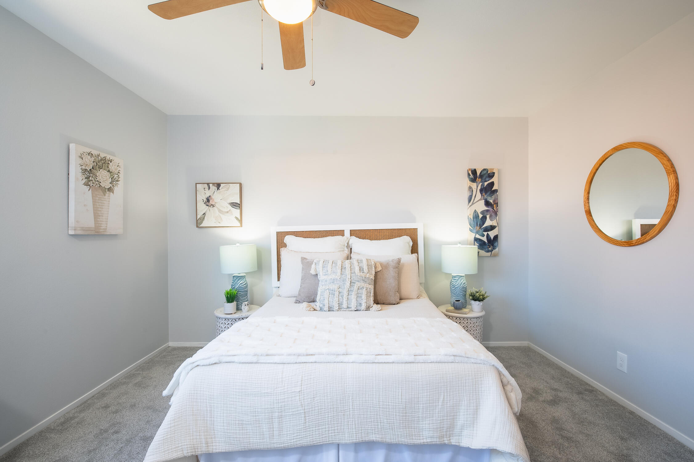 4344 Modoc Road, Unit 2 Santa Barbara, CA 93110 - Photo 17 of 28 a bedroom with a bed and a chandelier