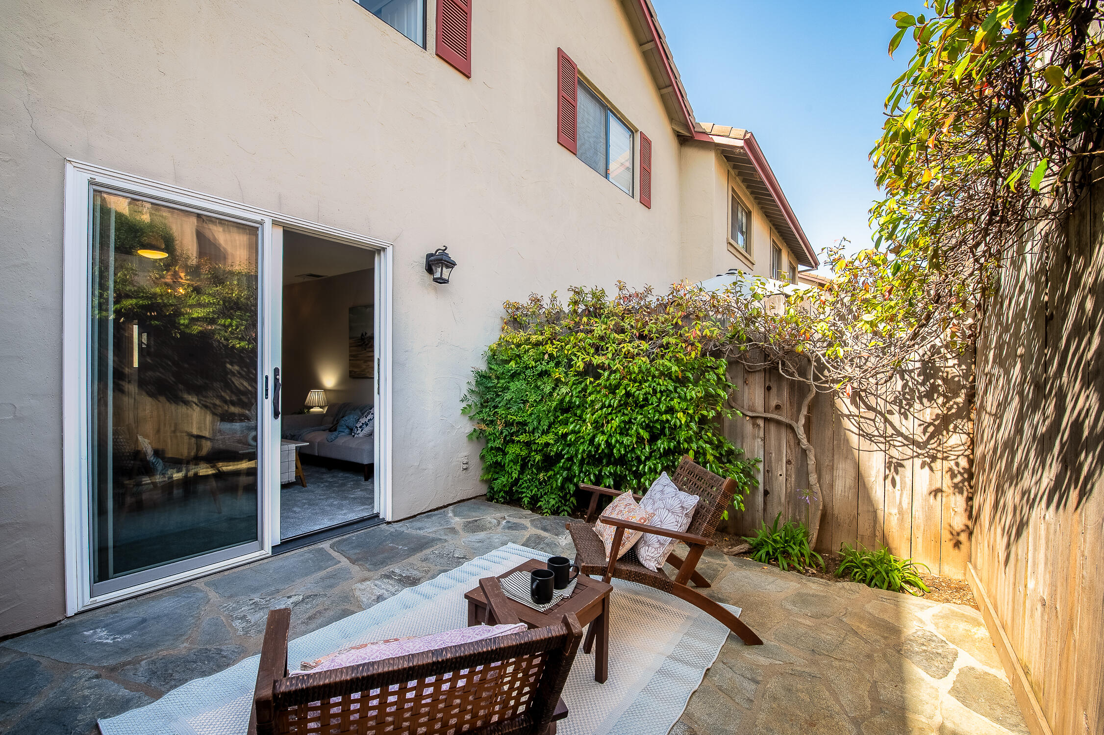 4344 Modoc Road, Unit 2 Santa Barbara, CA 93110 - Photo 27 of 28 a backyard of a house with outdoor seating