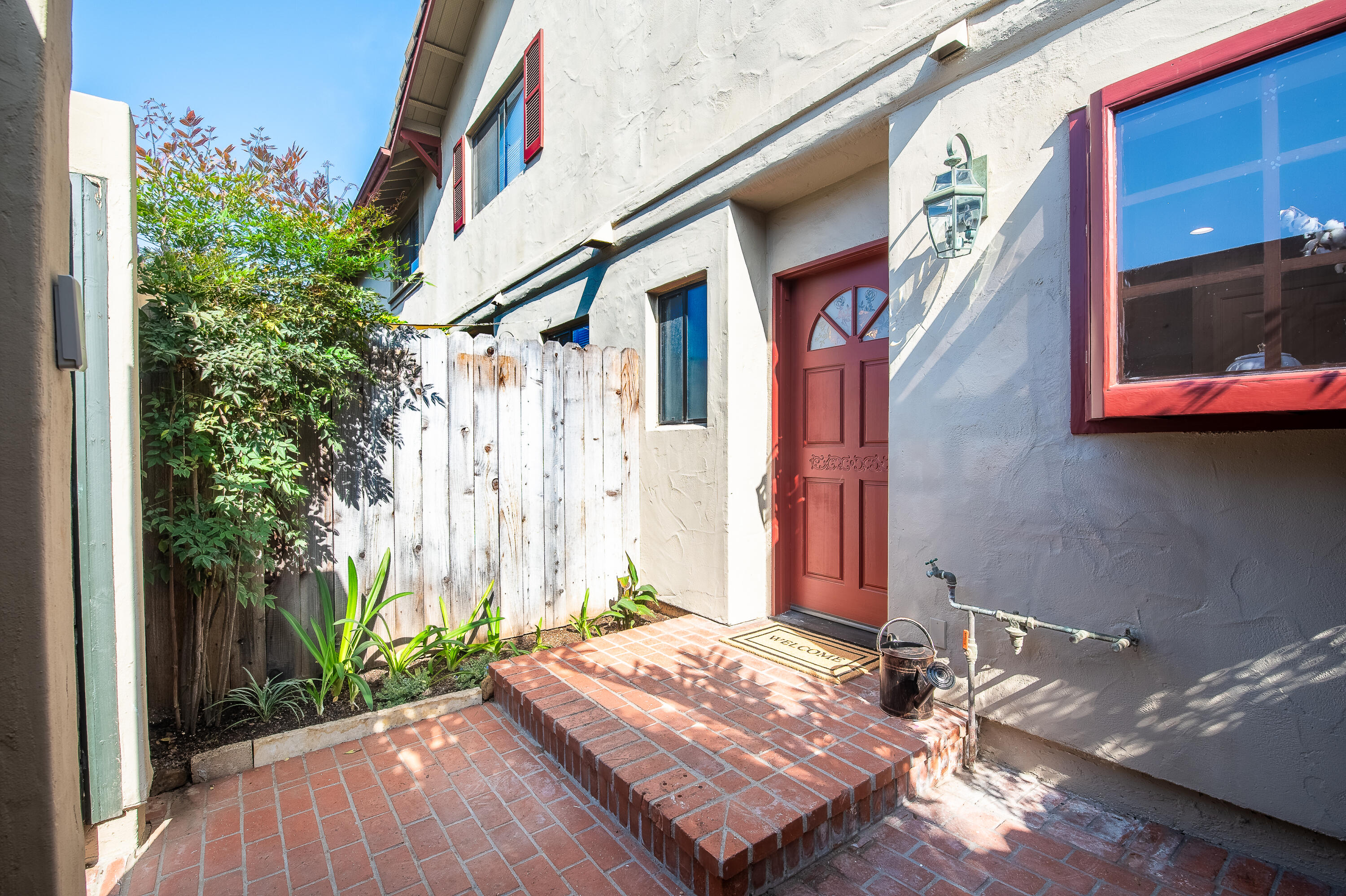 4344 Modoc Road, Unit 2 Santa Barbara, CA 93110 - Photo 3 of 28 a backyard of a house with outdoor seating