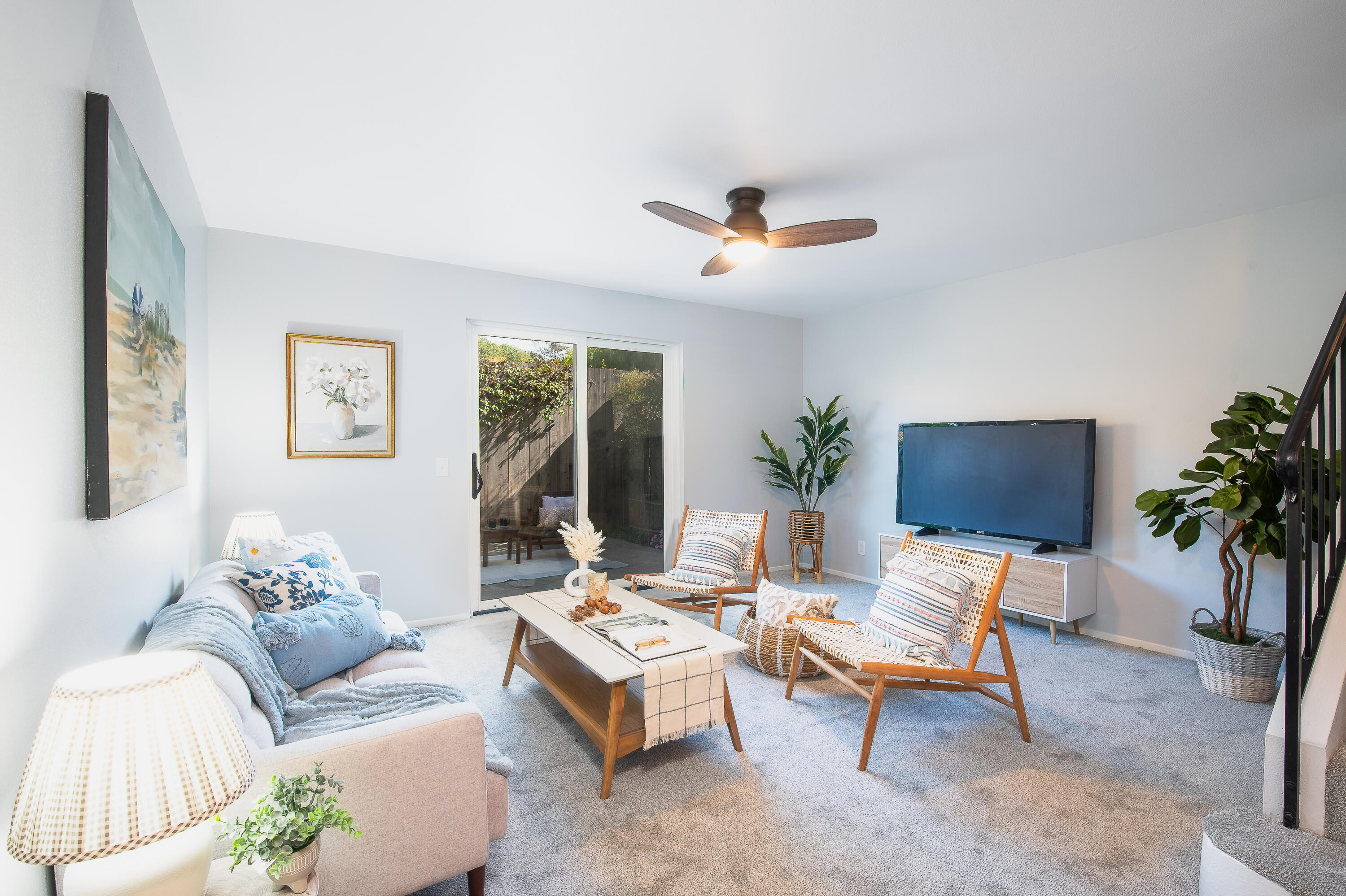 4344 Modoc Road, Unit 2 Santa Barbara, CA 93110 - Photo 5 of 28 a living room with furniture potted plant and a window