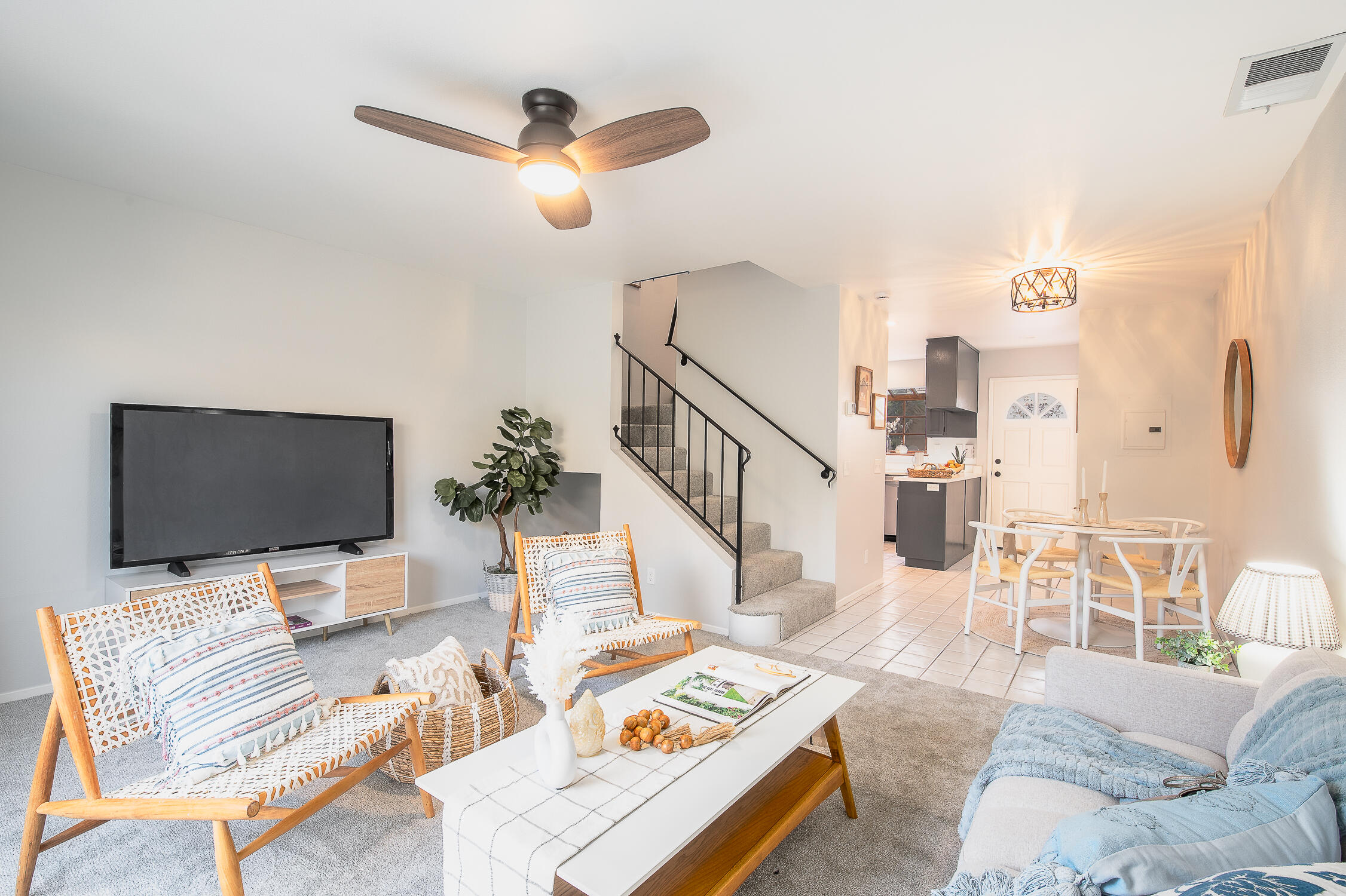 4344 Modoc Road, Unit 2 Santa Barbara, CA 93110 - Photo 9 of 28 a living room with furniture and a flat screen tv