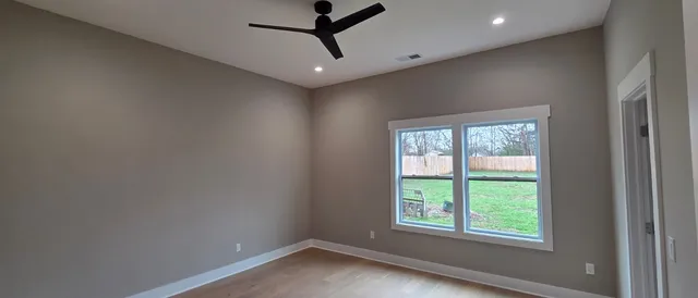 a view of a room with a window