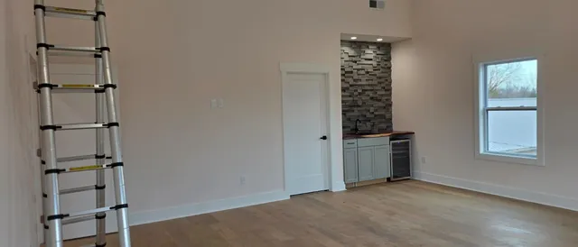 an empty room with windows