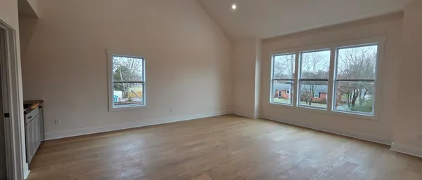 an empty room with windows