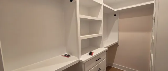 a bathroom with a tub and shower