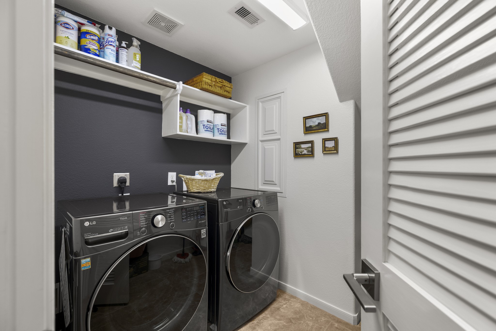 26 Winhall Place The Woodlands, TX 77354 - Photo 11 of 49 THIS, is a dream come true! Laundry room big enough for additional storage, folding area and second refrigerator.