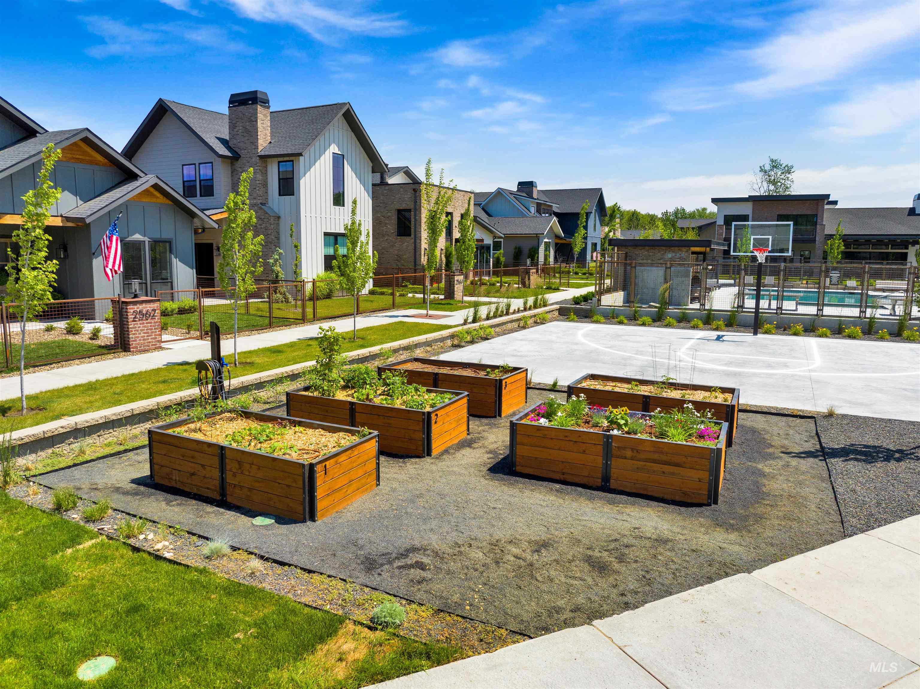 2526 West Rustic Forge Street Eagle, ID 83616 - Photo 14 of 50 Surrounding community with a garden, a residential view, community basketball court, and a pool