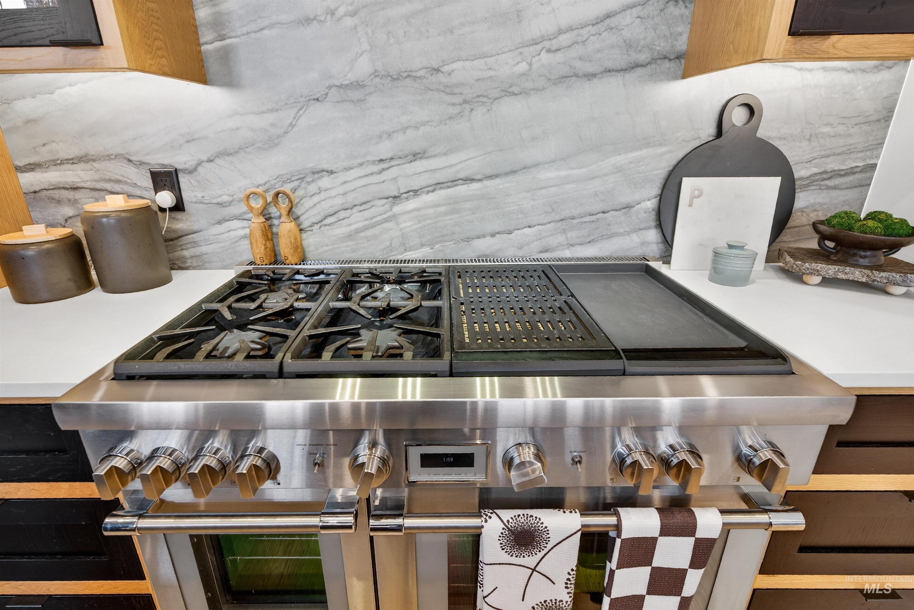 2526 West Rustic Forge Street Eagle, ID 83616 - Photo 24 of 50 Kitchen view of double oven range and decorative backsplash