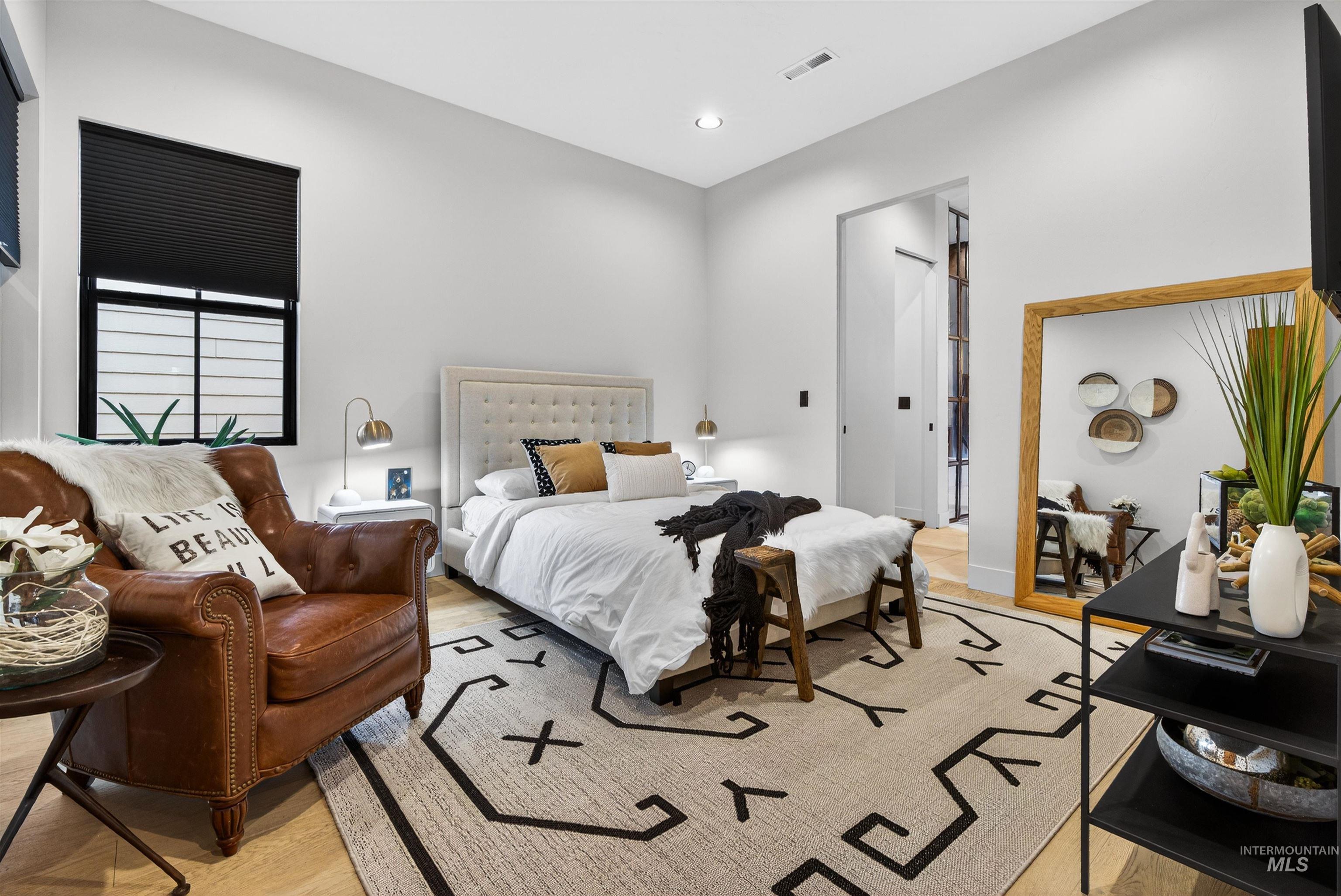 2526 West Rustic Forge Street Eagle, ID 83616 - Photo 31 of 50 Bedroom with light wood-style floors and recessed lighting