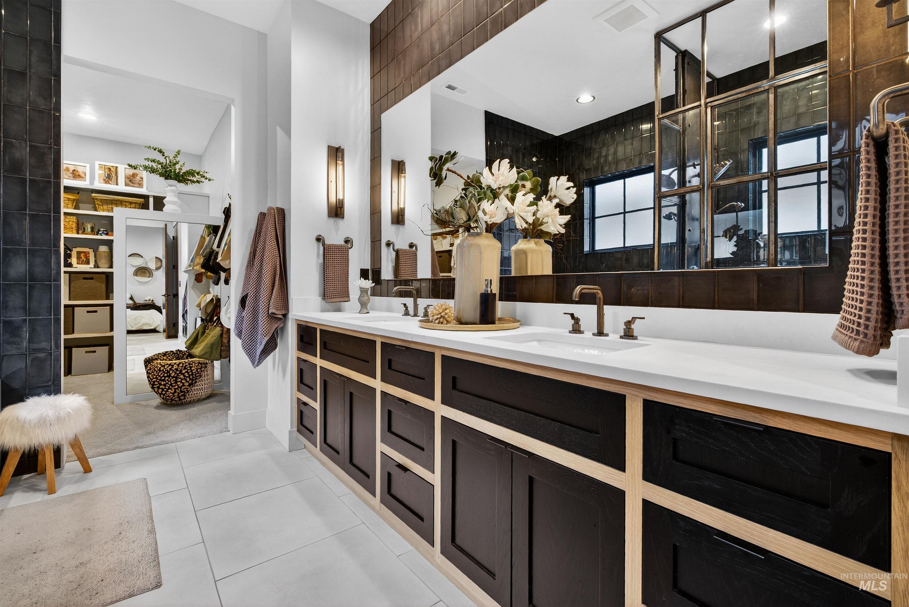 2526 West Rustic Forge Street Eagle, ID 83616 - Photo 36 of 50 Full bathroom with double vanity and light tile patterned flooring