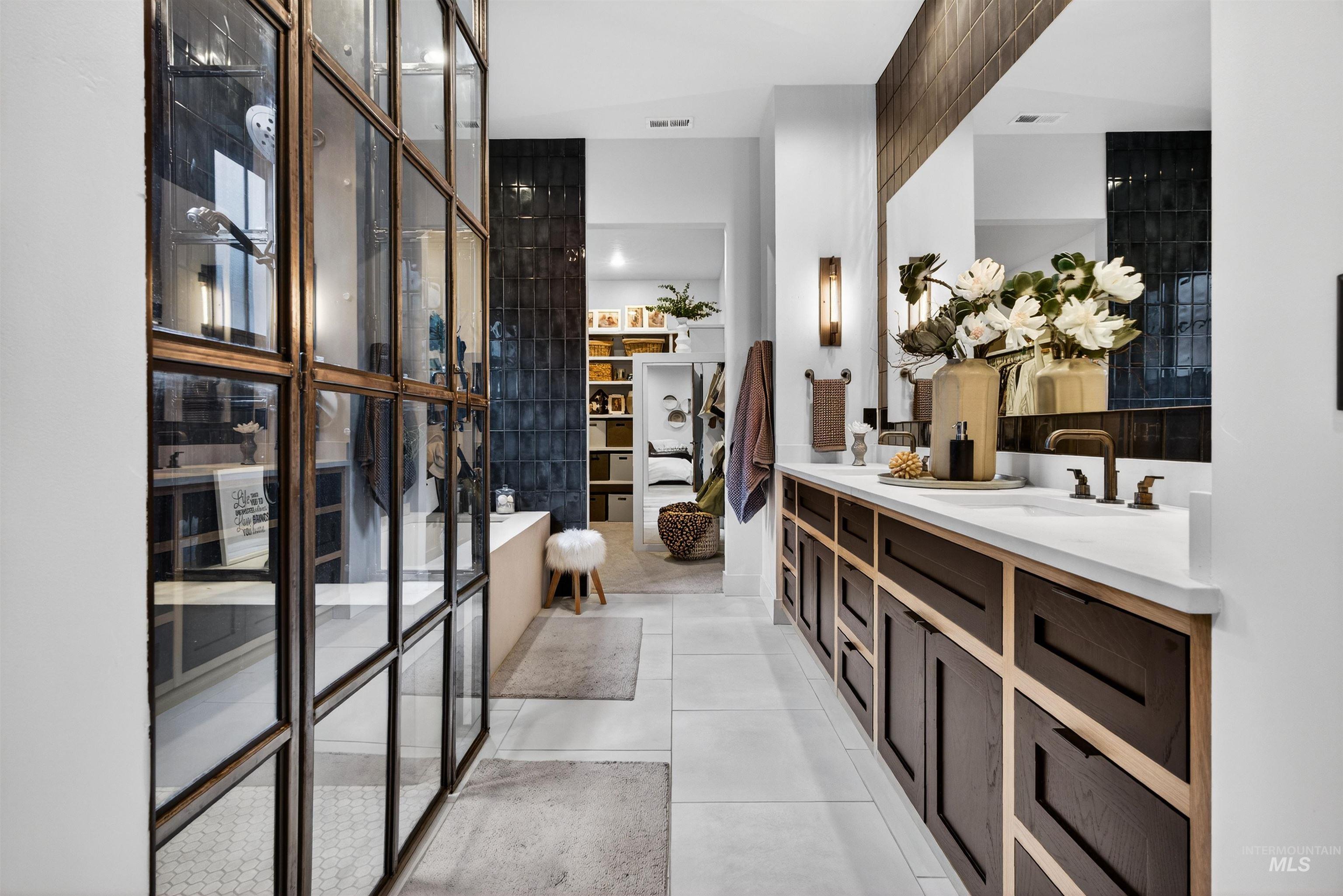 2526 West Rustic Forge Street Eagle, ID 83616 - Photo 37 of 50 Full bathroom featuring double vanity and light tile patterned floors