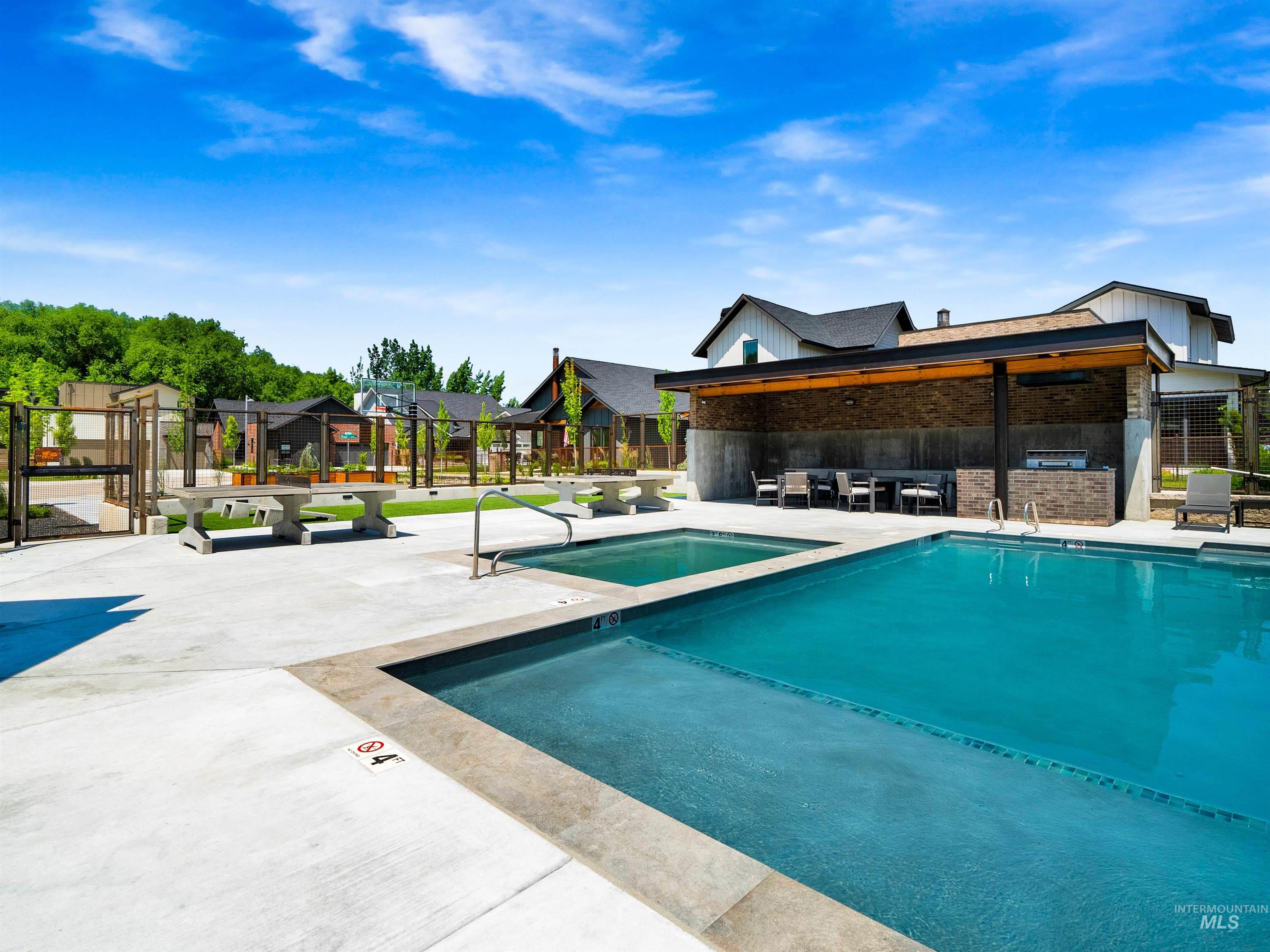 2526 West Rustic Forge Street Eagle, ID 83616 - Photo 9 of 50 Community pool featuring a patio area and a community hot tub