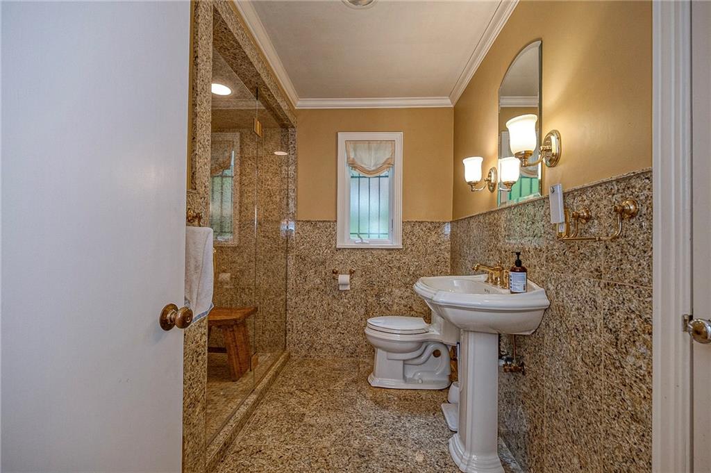 100 Cascade Road Pittsburgh, PA 15221 - Photo 16 of 30 The main bathroom has a granite shower stall, walls and flooring.