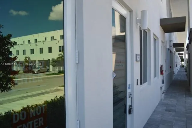 a view of a street with cars