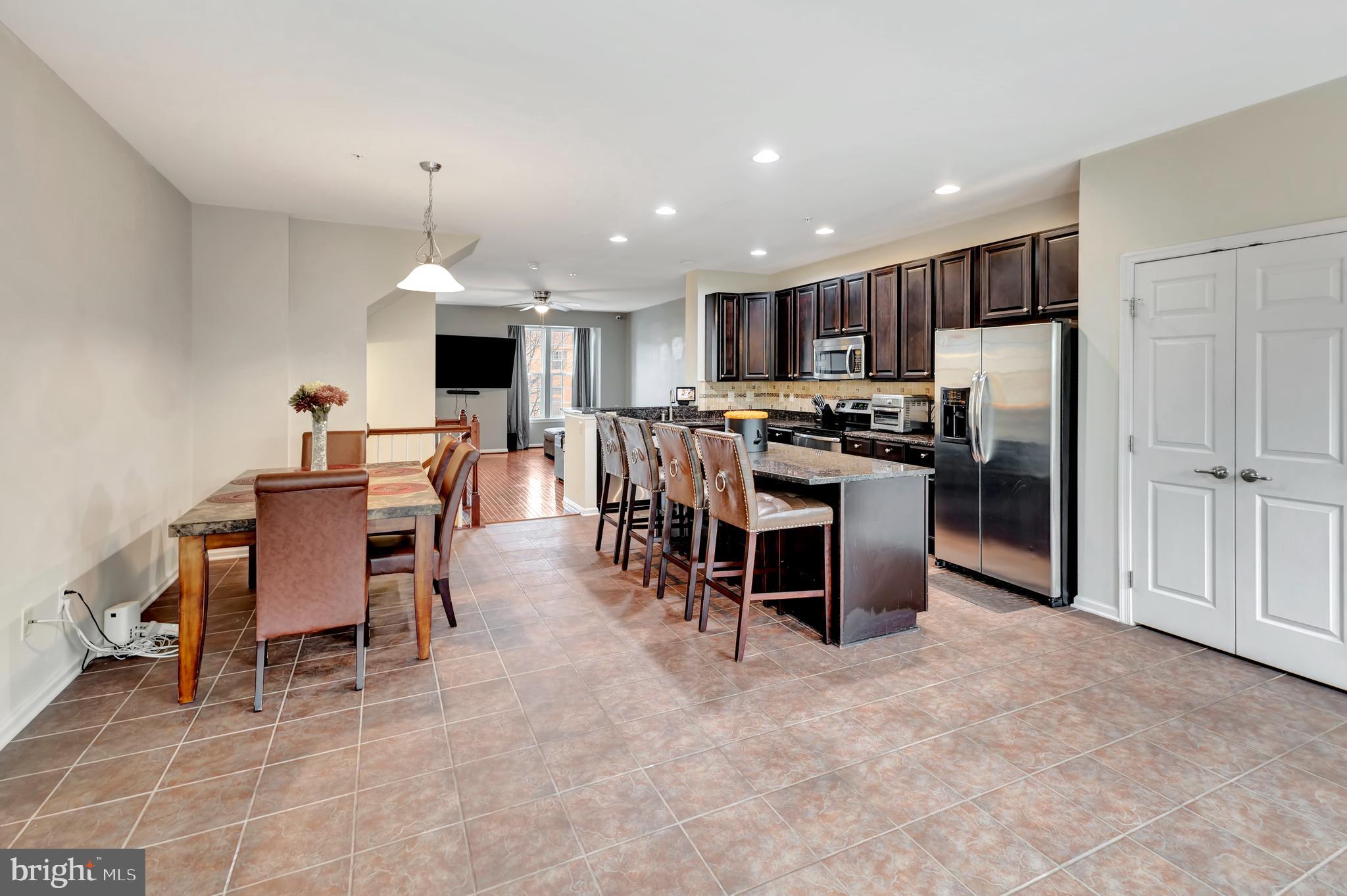 2063 Spring Run Circle Frederick, MD 21702 - Photo 11 of 28 a view of kitchen with refrigerator and chairs