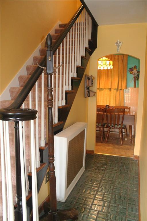 67 Warren Street Pittsburgh, PA 15205 - Photo 11 of 39 a view of entryway and hall with wooden floor