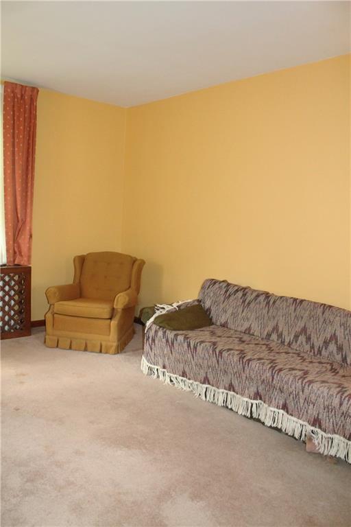 67 Warren Street Pittsburgh, PA 15205 - Photo 16 of 39 a living room with couches and painted walls