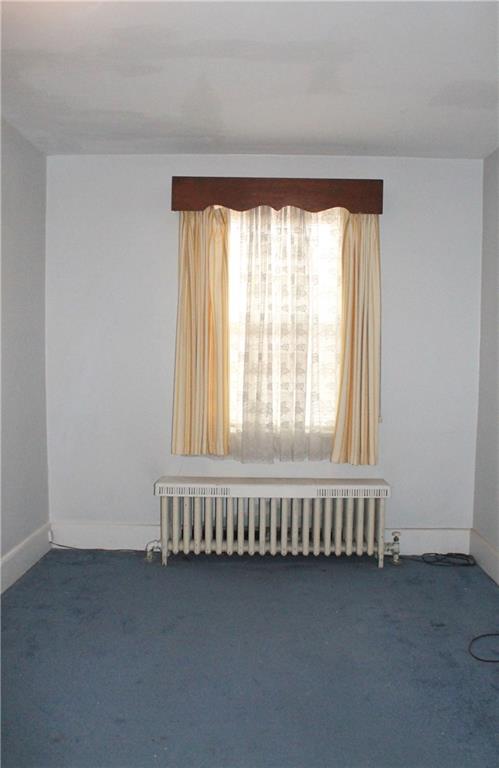 67 Warren Street Pittsburgh, PA 15205 - Photo 27 of 39 an empty room with a window