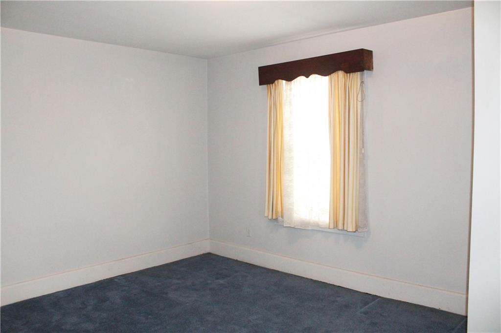 67 Warren Street Pittsburgh, PA 15205 - Photo 28 of 39 an empty room with a window